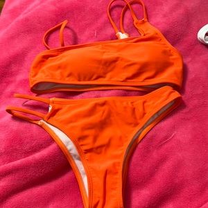orange bikini. never comfortable. never worn
